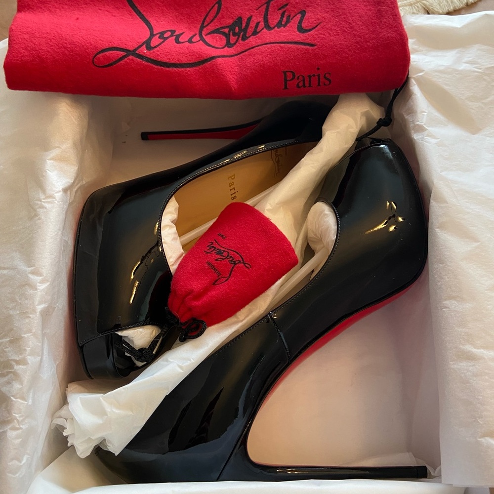 Christian Louboutin peep toe black pumps